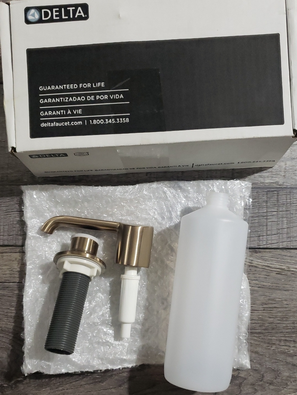 "NO STRAW" Delta RP101188CZPR Emmeline soap Dispenser, Lumicoat Champagne Bronze
